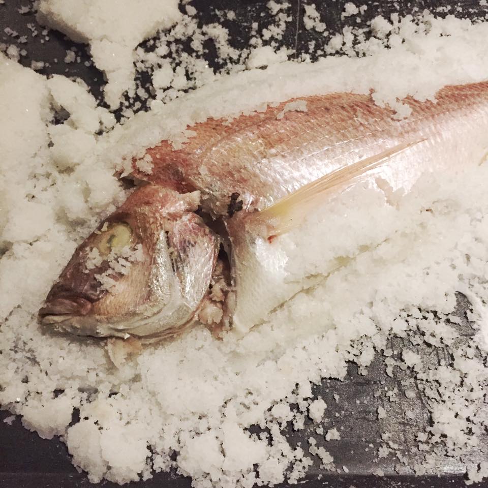 Salt-baked fragolino fish